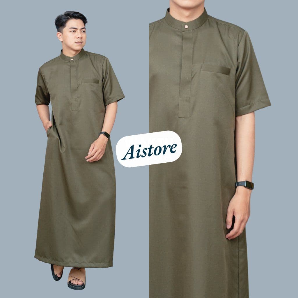 Man wearing an olive green short-sleeved thobe with a mandarin collar and a chest pocket.